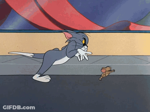 A Cartoon Of Tom And Jerry Playing With Each Other On A Sidewalk GIF