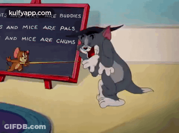 A Cartoon Of Tom And Jerry Standing Next To A Blackboard With A Quote On It . GIF
