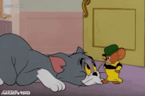 A Cartoon Of Tom And Jerry With The Words Mematic & Tenor Below Them GIF