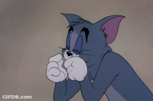 A Cartoon Of Tom Covering His Eyes With His Paws GIF