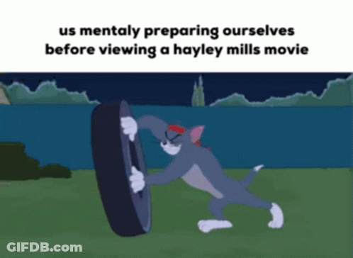 A Cartoon Of Tom Holding A Tire With The Caption " Us Mentally Preparing Ourselves Before Viewing A Hayley Mills Movie GIF