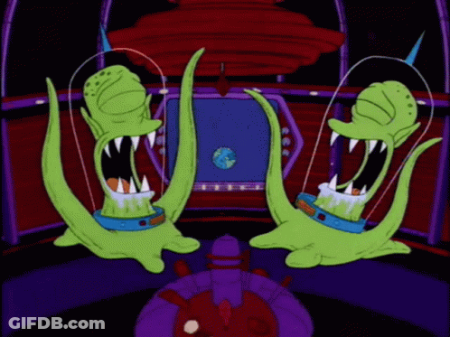 A Cartoon Of Two Green Aliens In A Space Suit GIF