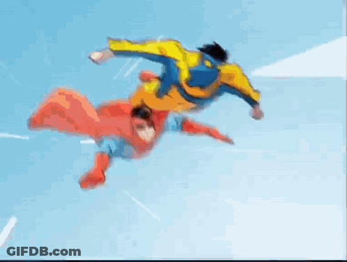 A Cartoon Of Two Superheros Flying In The Air . GIF