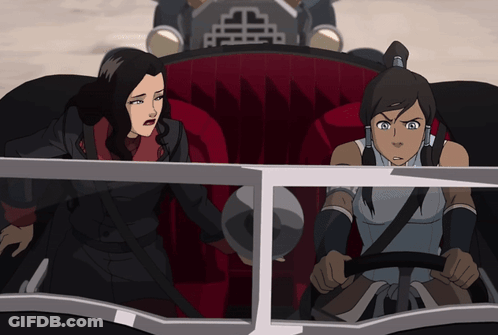 A Cartoon Of Two Women In A Car With A Chinese Symbol On The Side GIF