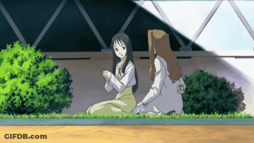 A Cartoon Of Two Women Sitting On The Grass Talking GIF