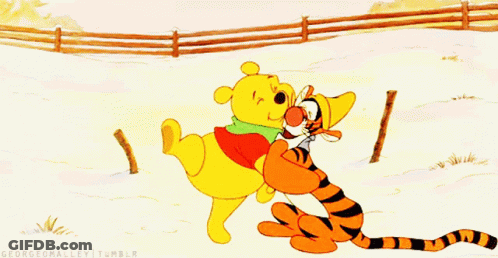 A Cartoon Of Winnie The Pooh And Tigger Hugging In The Snow GIF