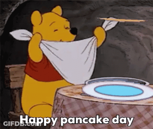 A Cartoon Of Winnie The Pooh Holding A Towel Around His Neck While Holding A Pancake . GIF