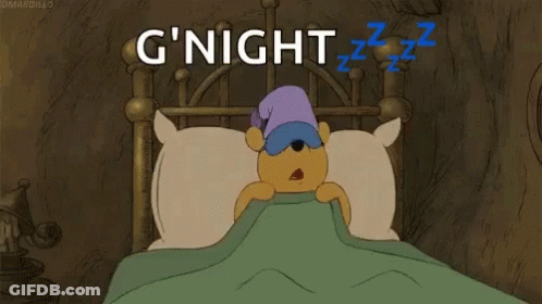 A Cartoon Of Winnie The Pooh Sleeping In A Bed With A Sleep Mask On . GIF