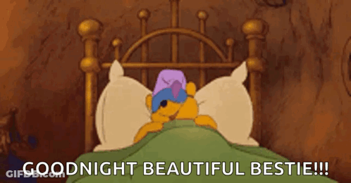 A Cartoon Of Winnie The Pooh Sleeping In A Bed With The Words `` Goodnight Beautiful Bestie ! '' GIF