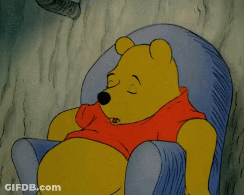 A Cartoon Of Winnie The Pooh Sleeping In A Chair With His Eyes Closed GIF
