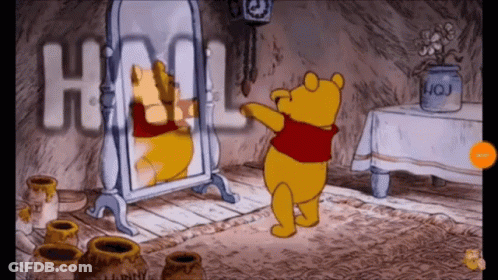 A Cartoon Of Winnie The Pooh Standing In Front Of A Mirror With The Word Hall Painted On The Wall GIF
