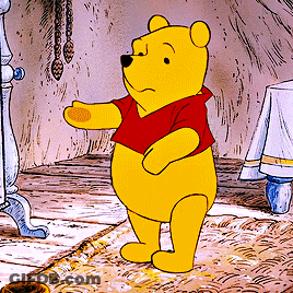 A Cartoon Of Winnie The Pooh Standing On A Rug In A Room GIF