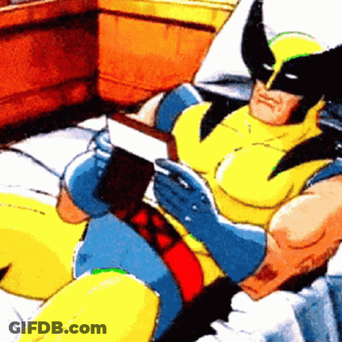 A Cartoon Of Wolverine Reading A Book In A Bed GIF