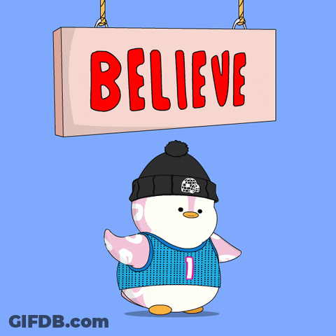 Cartoon Penguin Holding Believe Sign GIF