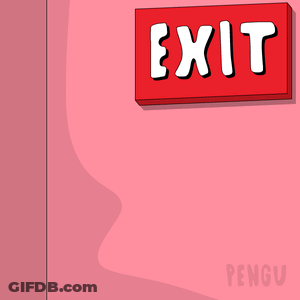 Penguin Standing In Front Of Exit Sign GIF