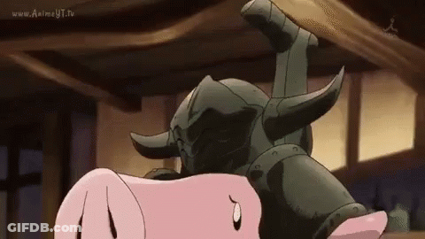 A Cartoon Pig Is Laying On Top Of A Statue Of A Bull . GIF