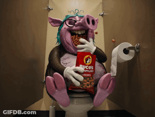 A Cartoon Pig Is Sitting On A Toilet With A Bag Of Buces In His Mouth GIF