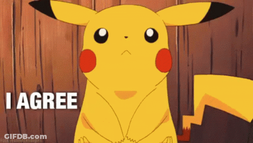 A Cartoon Pikachu Says I Agree In Front Of A Wooden Background GIF