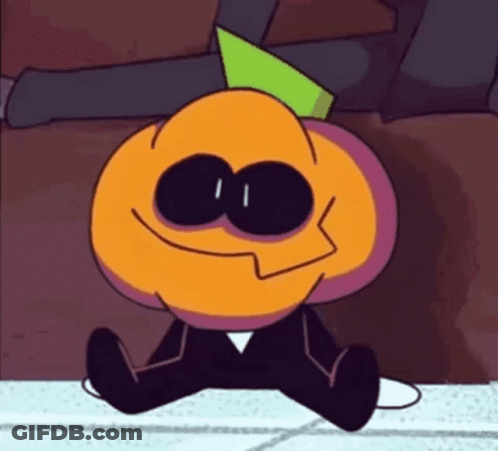 A Cartoon Pumpkin With A Green Hat Is Sitting On The Floor And Smiling . GIF