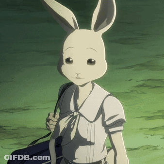 A Cartoon Rabbit Is Holding A Blue Bag GIF