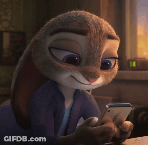 A Cartoon Rabbit Is Looking At A Cell Phone With A Clock In The Background That Reads 11:18 GIF