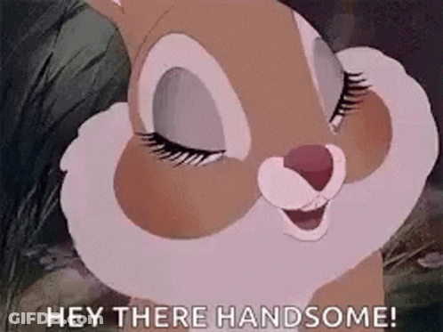A Cartoon Rabbit Is Smiling With Its Eyes Closed And Saying `` Hey There Handsome ! '' GIF