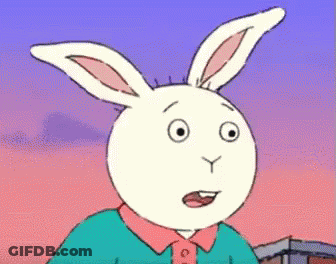 A Cartoon Rabbit With A Surprised Look On His Face . GIF