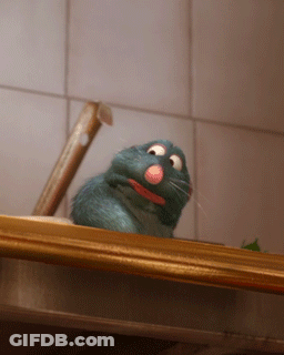 A Cartoon Rat With A Pink Nose Is Sitting On A Counter GIF