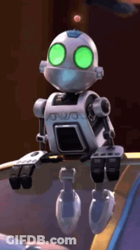 A Cartoon Robot With Green Eyes Is Sitting On A Shelf . GIF