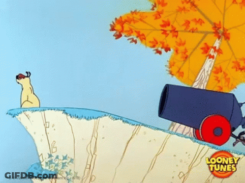 A Cartoon Scene From Looney Tunes With A Cannon And A Tree GIF