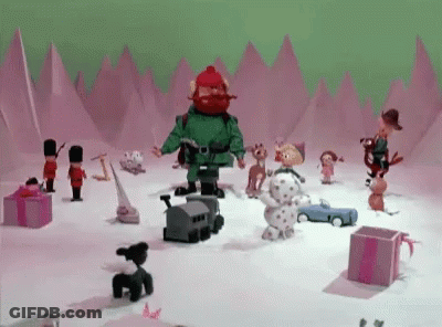 A Cartoon Scene With Santa Claus And Toys In The Snow GIF
