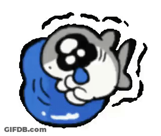 A Cartoon Shark Is Sitting On A Blue Pillow . GIF