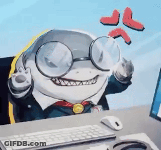 A Cartoon Shark Wearing Glasses Is Sitting At A Desk Next To A Computer . GIF
