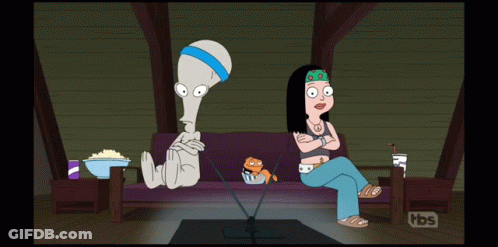 A Cartoon Shows A Man And A Woman Sitting On A Couch With Tbs Written On The Bottom GIF