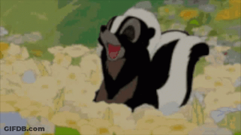 A Cartoon Skunk Is Sitting In A Field Of Flowers With Its Mouth Open GIF