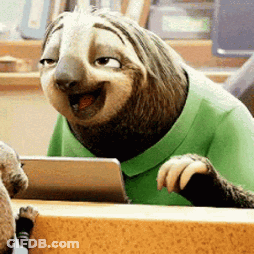 A Cartoon Sloth Wearing A Green Shirt Is Sitting At A Table With A Tablet . GIF