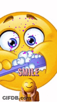 A Cartoon Smiley Face Is Brushing His Teeth With A Purple Toothbrush And Smiling GIF