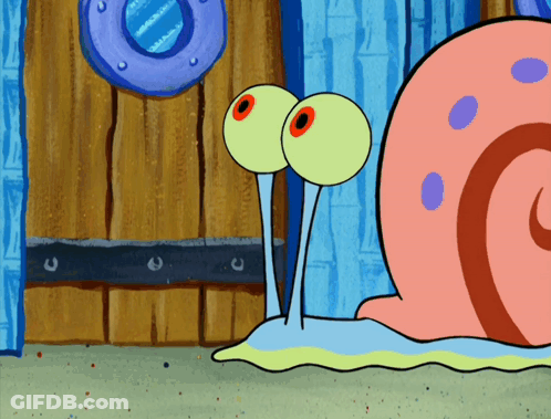 A Cartoon Snail With Big Eyes Is Looking At Something GIF