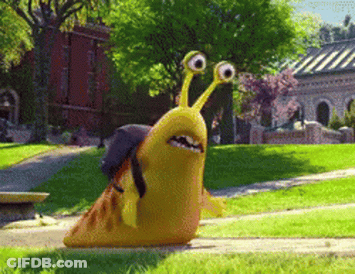 A Cartoon Snail With Big Eyes Is Walking Down A Sidewalk In A Park GIF