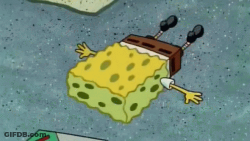 A Cartoon Spongebob Squarepants Character Is Laying On His Back On The Ground GIF