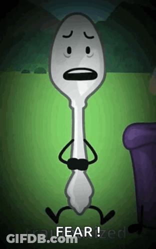 A Cartoon Spoon With A Sad Face And Arms And Legs Is Sitting On A Couch . GIF