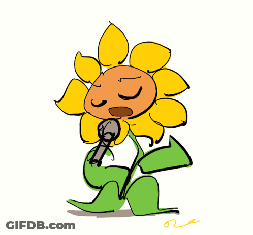 A Cartoon Sunflower Singing Into A Microphone GIF