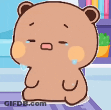 A Cartoon Teddy Bear Is Crying And Sitting On A Rug In A Room . GIF