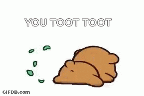 A Cartoon Teddy Bear Is Laying Down With A Green Bubble Coming Out Of Its Butt . GIF
