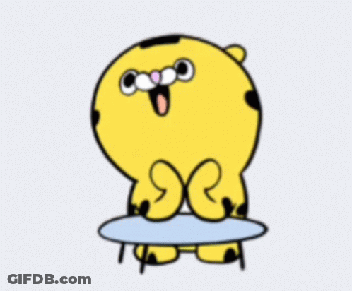 A Cartoon Tiger Is Sitting On A Table With Its Eyes Closed GIF