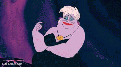 A Cartoon Ursula From The Little Mermaid Is Smiling And Making A Face . GIF