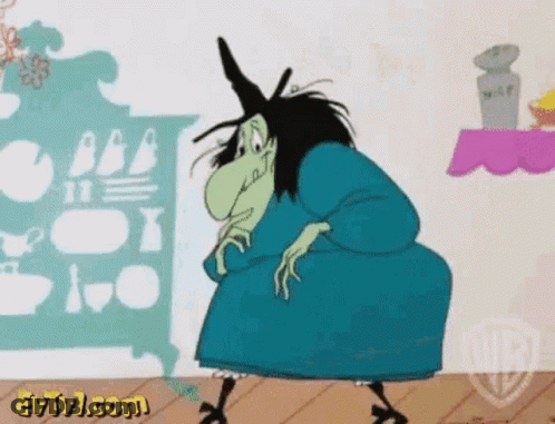 A Cartoon Witch In A Blue Dress Is Standing In Front Of A Shelf . GIF