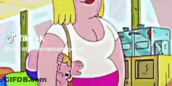 A Cartoon Woman Is Holding A Baby In Her Arms While Walking Down A Street . GIF