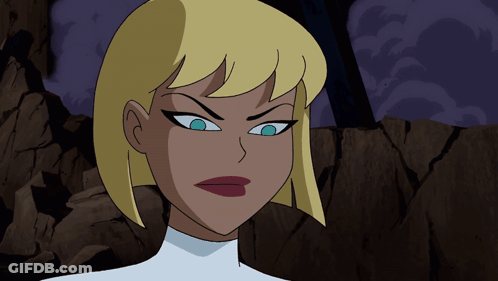 A Cartoon Woman With Blonde Hair And Blue Eyes GIF