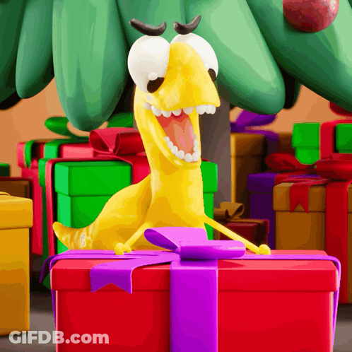 A Cartoon Worm Is Sitting On A Red Gift Box GIF